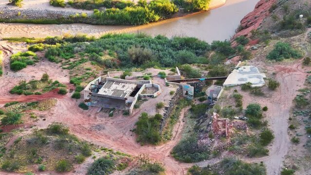 Aerial Virgin River gorge St George Utah abandoned ruins. Geological landscape wind, weather and water carved erosion. Tourist destination outdoor recreation.