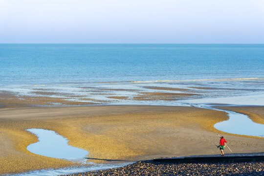 Fishing on foot in Picardy coast. Ault village
