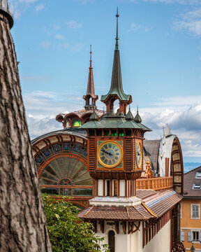 Refreshment room Cachat and its clocktower being restored, near the historical mineral water source in Evian-les-Bains, Haute Savoie, France