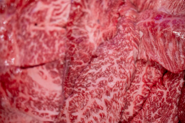 Close-up of rare meat, prepared for barbecue grill with soft focus