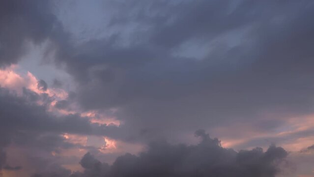 Moody sky. Time-lapse of dramatic storm clouds. Moving cumulus clouds in evening. Evening dark sky time lapse