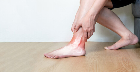 Obraz na płótnie Canvas Inflammation of the ankle bones a human