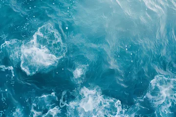 Zelfklevend Fotobehang Top view blue sea water texture background with wave and white bubble. Aerial image show color of ocean as ship passes through its deepest point. © D.APIWAT