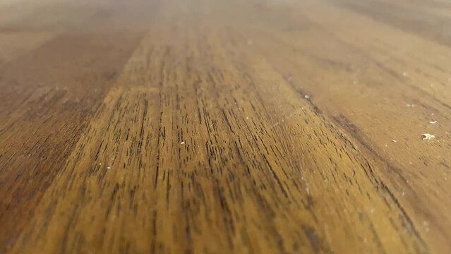 Details texture structure of wooden table close up view sliding straight line. Home improvement and interior design concept