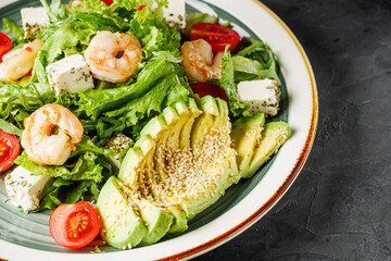 delicious fresh salad with shrimp, blue cheese and avocado