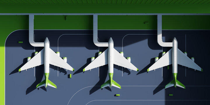 Top view of planes with jet bridge at the airport, boarding or disembarking