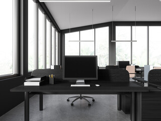 Office room interior with workplace, table and pc screen, panoramic window