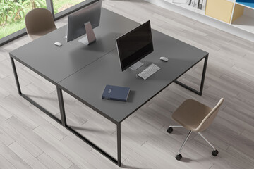 Gray computer tables in wooden floor office, top view