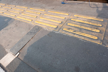 Yellow tactile paving for blind people