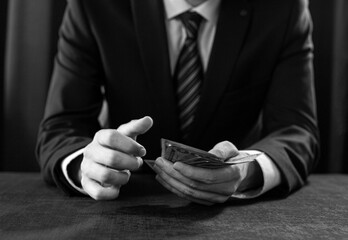 professional man holding money , black and white 