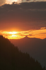 mountain silhouette with a beautiful orange sunset 