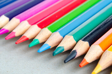 Color pencils on white background with customizable space for text. Copy space.