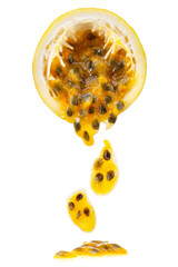 half of ripe yellow passionfruit with mixed tasty pulp isolated on white background. - obrazy, fototapety, plakaty