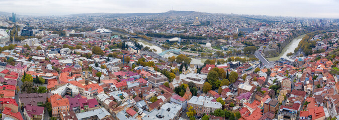 Panoramic aerial view of Tbilisi on cloudy autumn day. Georgia. © Kirill