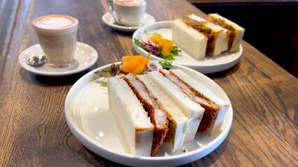 Cafe Breakfast, Brunch, Meal Delicious Sandro Sandwich European-style, Asian Fusion Style grilled meat chicken and meat sandwich soft bread with coffee latte and tea