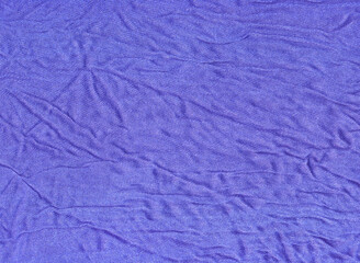 Purple rumpled cotton fabric. Natural material, high quality texture. Template of background for the design of a poster, cover, illustration.