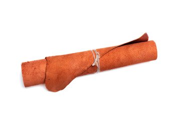 Leather rolled up piece isolated on white background. Top view.