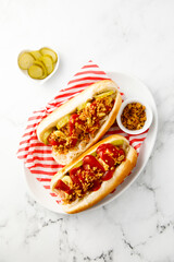 Traditional hot dogs with pickles