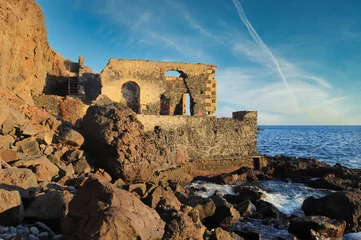 Fotobehang Canarische Eilanden The House of Freshwater in Playa San Juan (Tenerife). Possibly an old pumping station for fresh water flowing up the coast to the crops above.