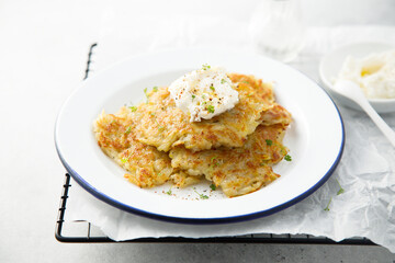 Homemade potato latkes with cream cheese