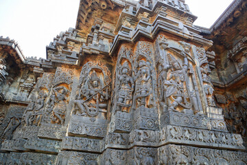 A Eye catching Sculpture carvings of Hindu Gods, Goddesses and Dancers on the exterior walls of...