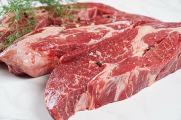 Plain fresh cut chuck steak prepared for cooking