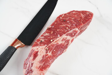 Plain fresh cut chuck steak prepared for cooking