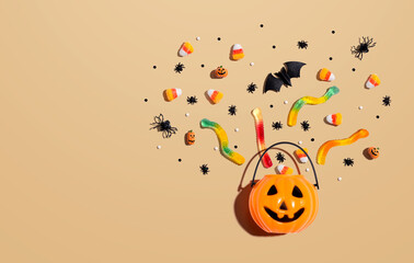 Halloween pumpkin with decorations - overhead view flat lay