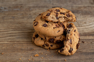 Brown cookies on wooden background