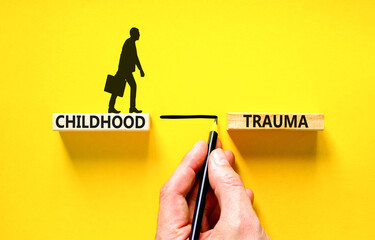 Childhood trauma symbol. Concept words Childhood trauma on beautiful wooden blocks. Beautiful...