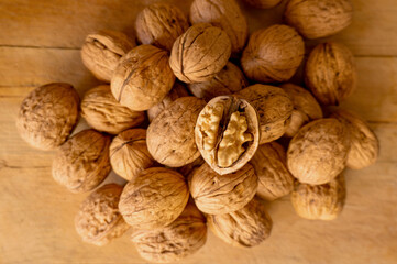 Walnuts on wooden background