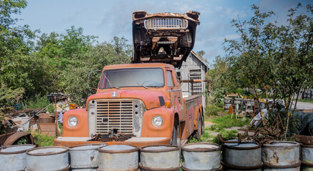 rust cars on the creperie tati in gotland sweden