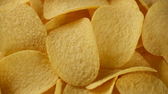 Zoom frame potato chips, rotating.