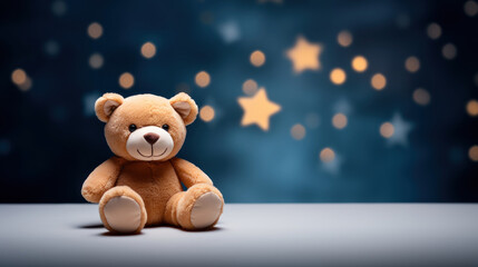 Brown bear peluche on dark blue background with golden stars