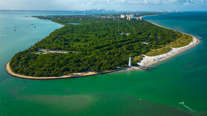 Aerial high angle establish of cape florida lighthouse Miami  - obrazy, fototapety, plakaty