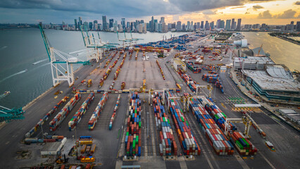 Miami south beach downtown port with skyline cityscape cargo container boat import and export USA...