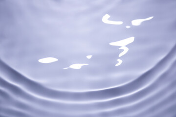 The surface of the water is clear, blue, soft and shiny.