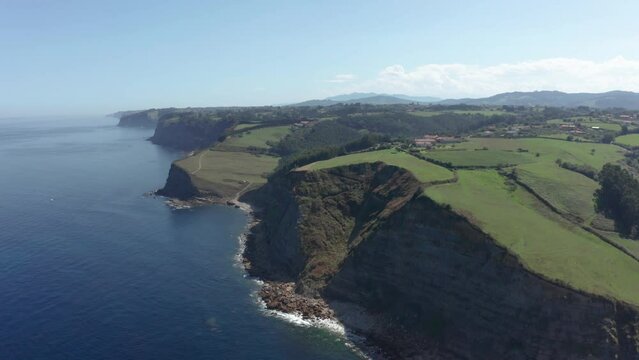 Sweeping drone footage unveils the scenic splendor of the Asturian coast, blending the tranquility of its beaches with the drama of its cliffs