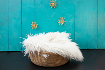 New born or baby portrait photography backdrop with white fur, straw snowflakes, jute rope basket © Dorin