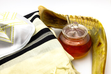 Shofar (horn), tallit, honey, apple  and pomegranate jewish traditional symbols .Rosh Hashanah...