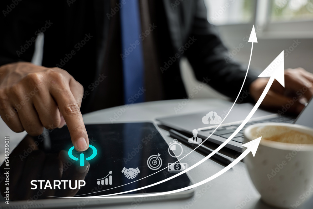 Poster businessman working on startup plan. graph chart of business growth on laptop with icon business and