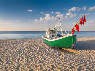 Fishing boat on the shores of Baltic Sea in summer