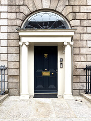 A famous dark green painted Georgian door in Dublin, Ireland