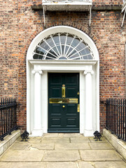 A famous dark green painted Georgian door in Dublin, Ireland