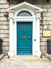 A famous blue green painted Georgian door in Dublin, Ireland