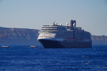 Luxury cruiseship cruise ship liner Eurodam anchoring at sea on sunny summer day during...