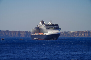 Luxury cruiseship cruise ship liner Eurodam anchoring at sea on sunny summer day during...
