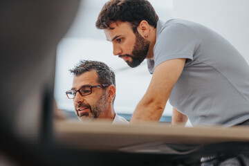 Fototapeta premium Efficient Team of Diverse Entrepreneurs Analyzing Reports and Creating a Strategic Plan for Future Success