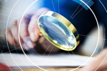 Business Auditor Using Magnifying Glass