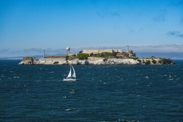 Alcatraz Island in San Francisco Bay seen from ship during Harbor Cruise from SFO tourist landmark...